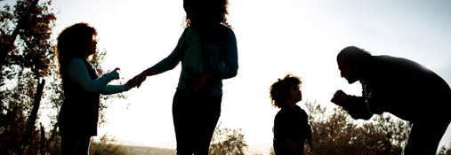 silhouette of family signing to each others.